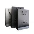 Rope handle luxury spot uv paper gift bag for promotion 